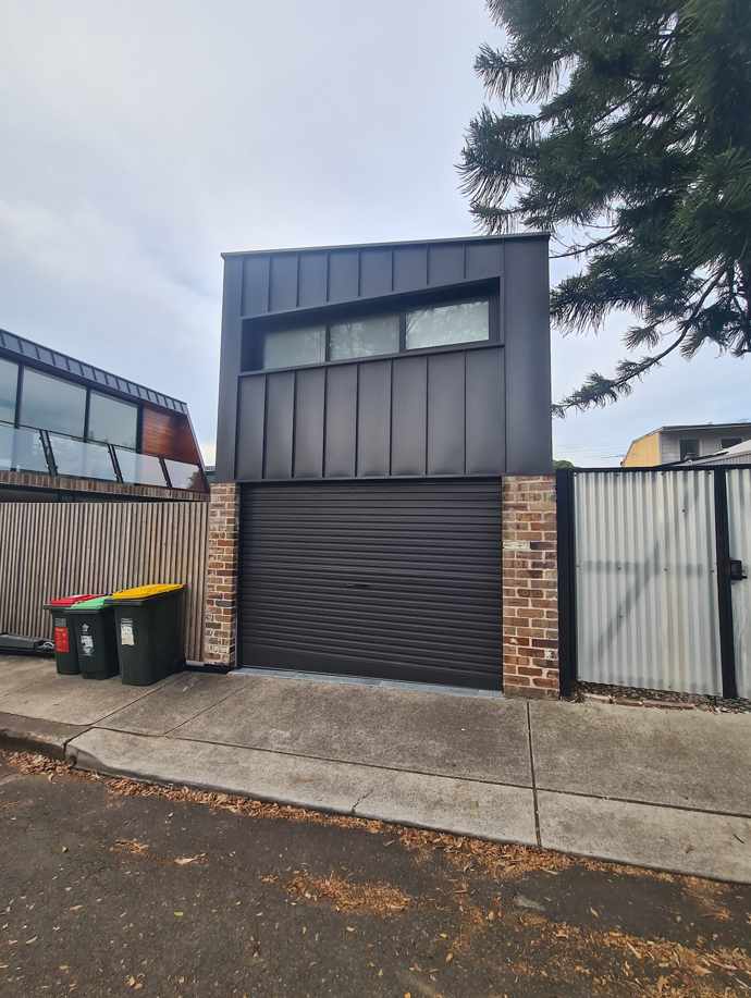 Modern black-clad terrace house on a Leichhardt back street, Inner West Sydney